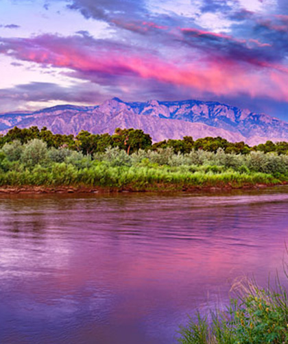 Sandia Mountains & Rio Grande River with Pink Sunset Photo by Bill Tondreau